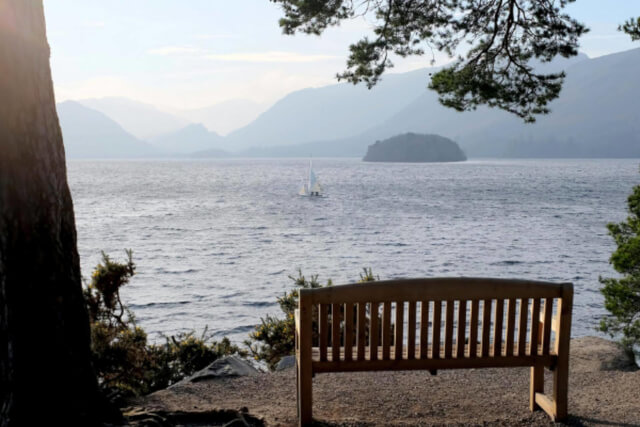 A wooden bench on the shores of Derwentwater