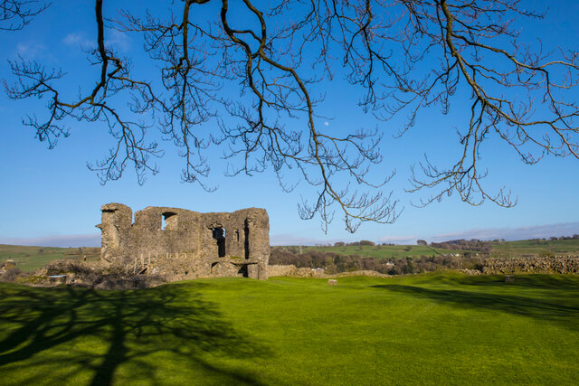 The ruins of Kendal Castle and the surrounding fields