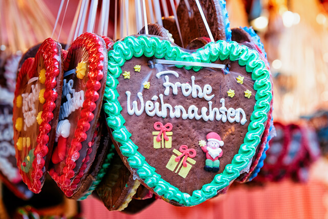 Stand with heart gingerbread sweets at Christmas Market