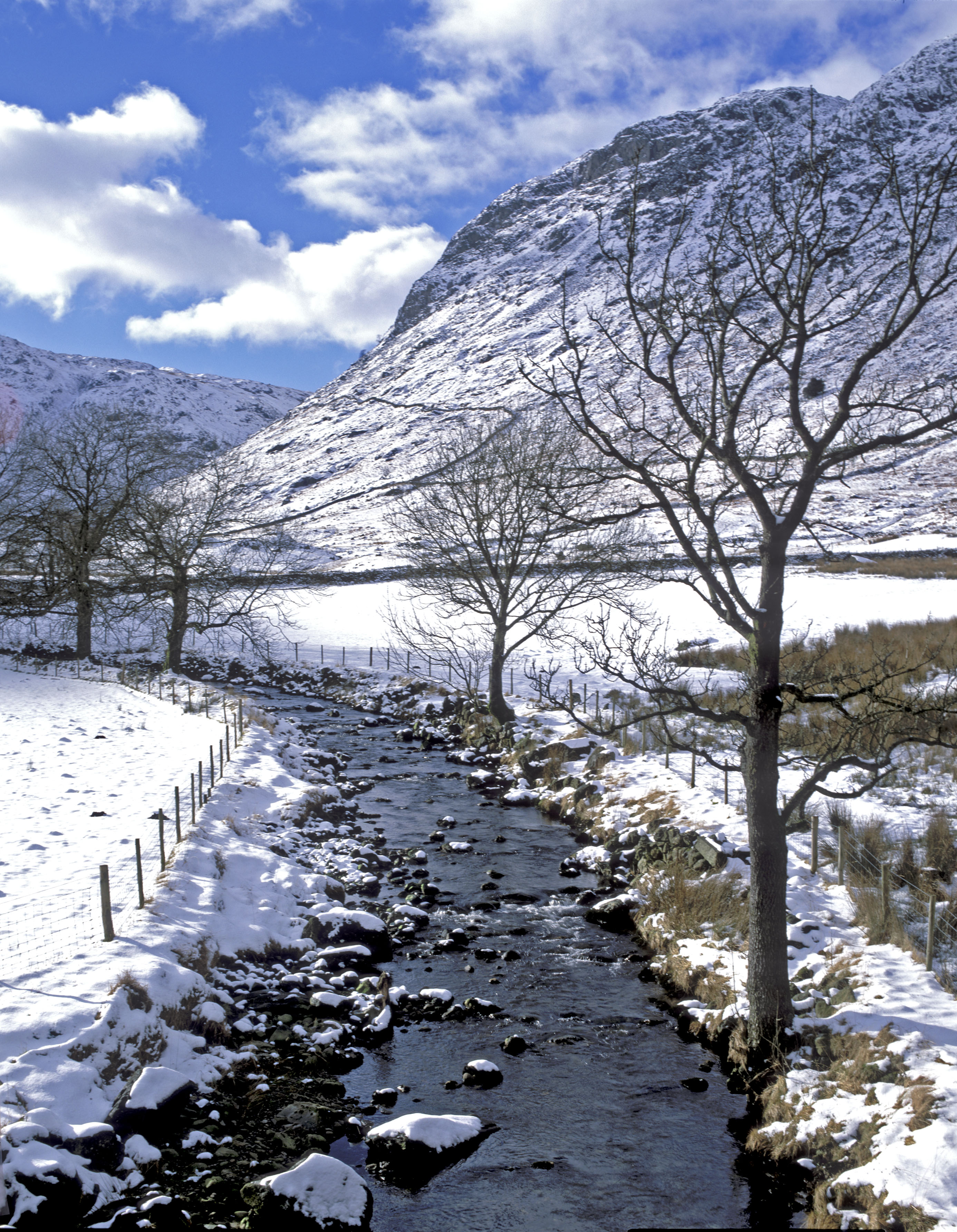 Wyth Burn covered in snow. A snowy scene next to the Southern shore of Thirlmere.