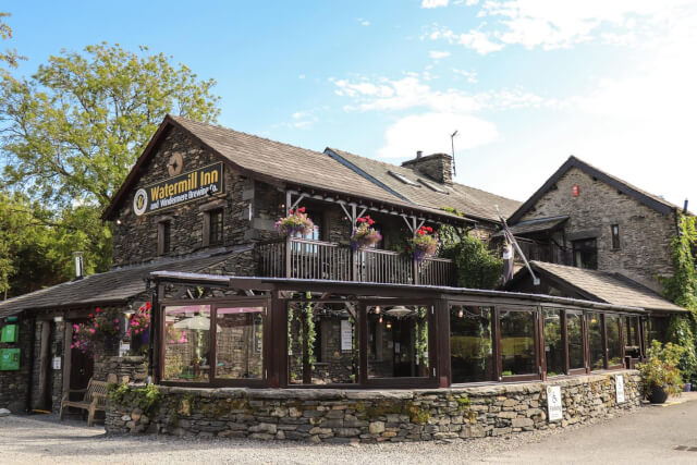 The stonebuilt exterior of the Watermill Inn