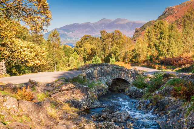 A view of Ashness Bridge and the surrounding countryside