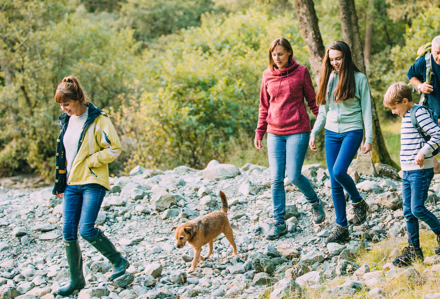 A family of three generations walking through the Lake District