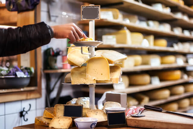 Cheese on display at a local farm shop