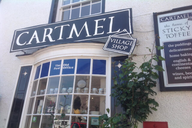 An external shot of the window and sign at Cartmel Village Store