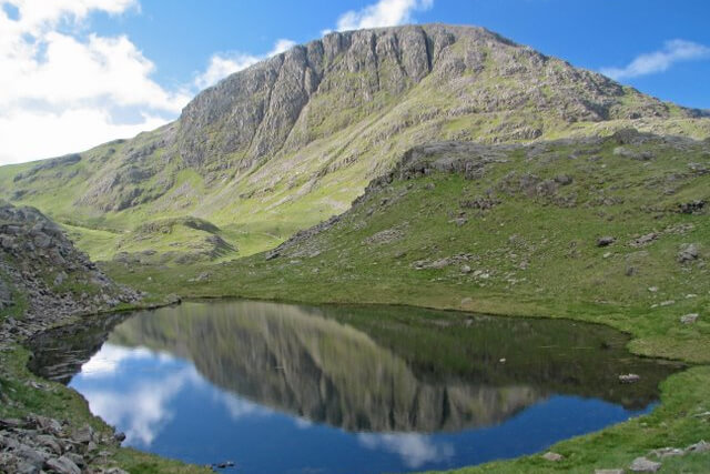 Great End Mountain and its reflection in a tarn in the Lake District