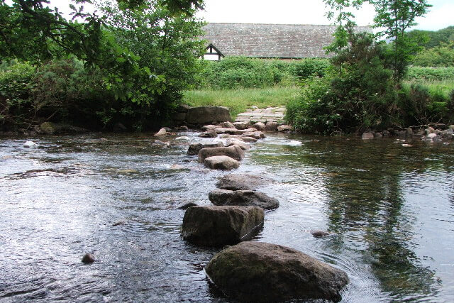Stepping stones crossing the River Esk towards St Catherines church