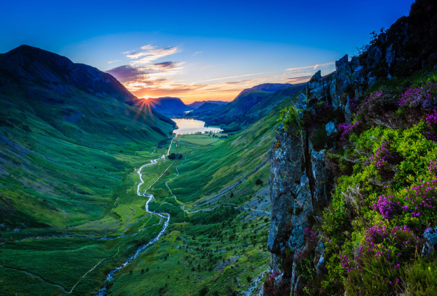 Image of the sun over Buttermere Valley in the Lake district in Cumbria