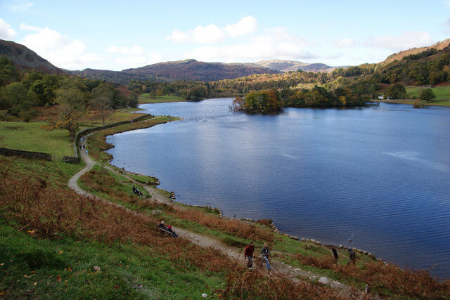 A view across a gravel foot path towards Rydal Water from the south shore of the lake 