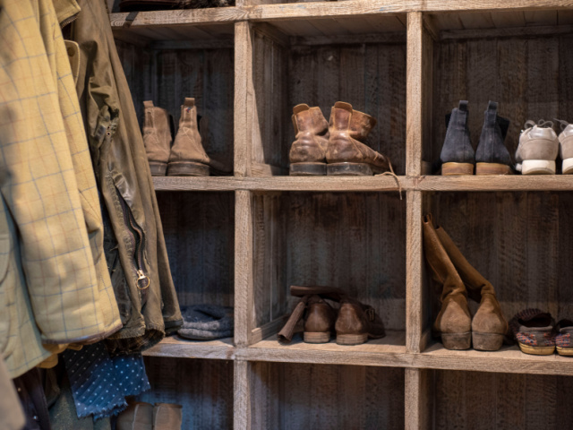 Boot room for holiday cottage guests to store boots and coats after hikinh