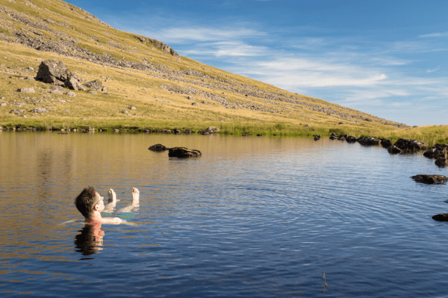 A refreshing dip in Greendale Tarn, Lake District
