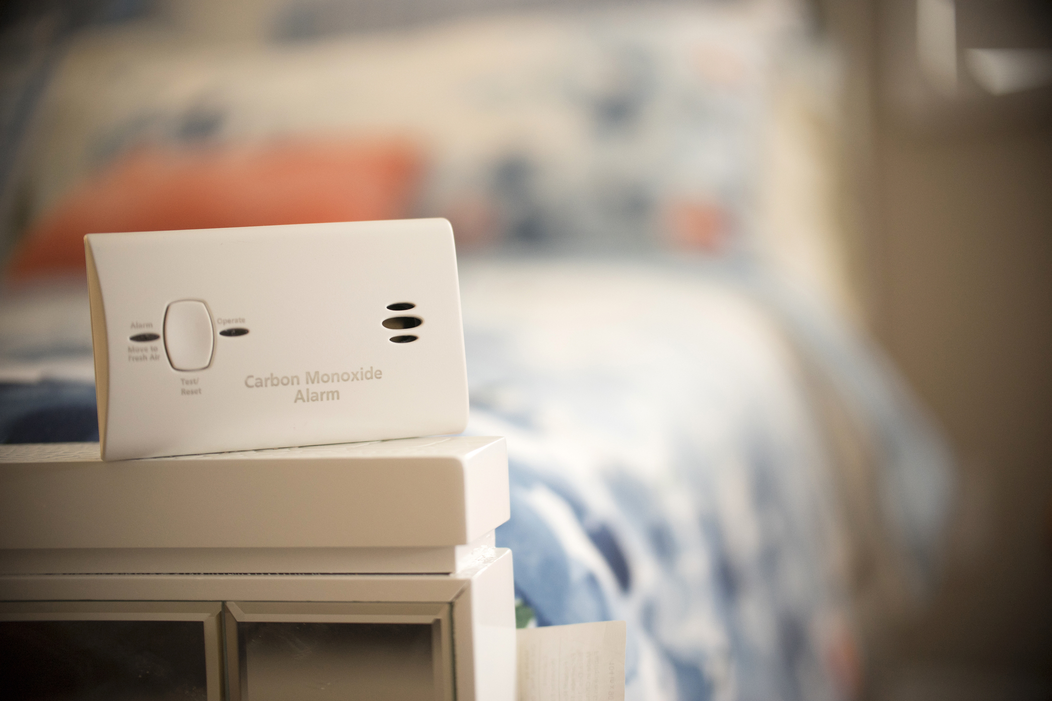 Carbon monoxide alarm in a bedroom